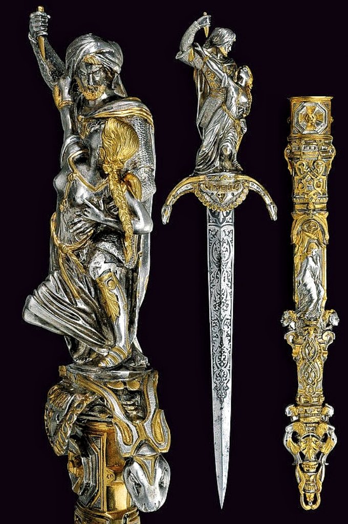 Gifted dagger depicting a scene from William Shakespear's Othello.

It was a gift to a performer of the role of Othello in Paris around 1860.