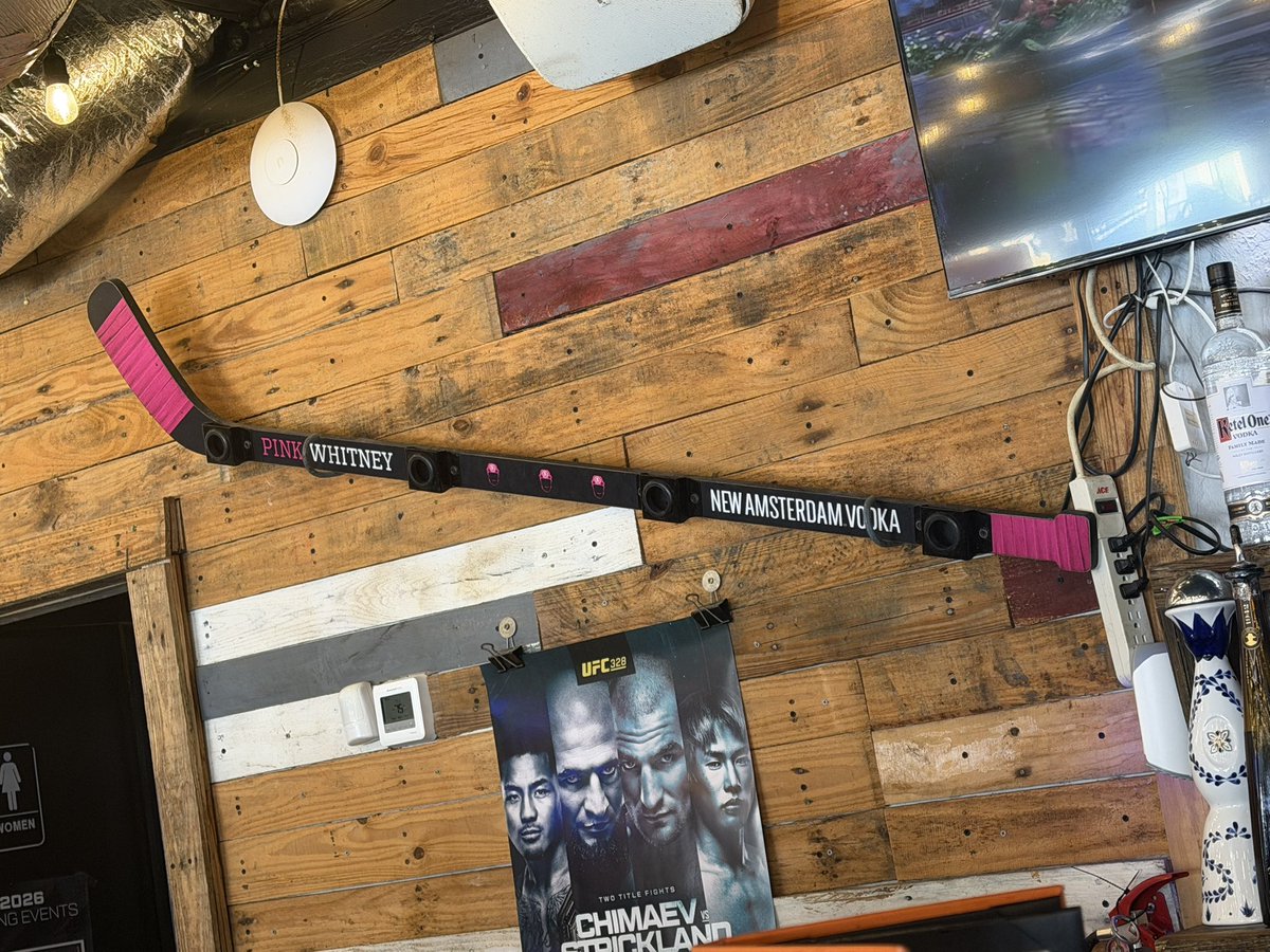 nashiscash's tweet photo. @stoolpresidente @BarstoolBigCat O/U 17.5 seconds for @ryanwhitney6 of the @spittinchiclets podcast to do a shotski off this Pink Whitney hockey stick? Stolen valor for someone who can’t chug? https://t.co/c5MY6Ict0S