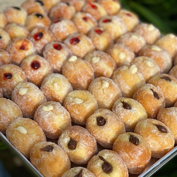 Thou prepareth a table before me in the presence of my enemies .......
Doughnut galore 
Which one are you eating??
Jam filling 
Dark chocolate filling 
White chocolate filling