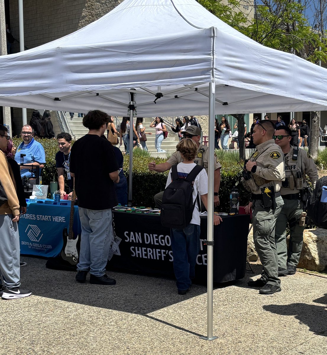 SDSheriff's tweet photo. Mission Hills High School in San Marcos invited the San Marcos Sheriff's Station to their Career Fair earlier this month. Students had the chance to explore a variety of future paths, from universities and military opportunities to skilled trades.

Our deputies shared info about the Explorer Cadet Program, RESPECT Project, and Junior Women’s Academy, and answered great questions about what a deputy’s shift looks like.

Always proud to connect with our youth and support their career journeys! @missionhillshs @SanMarcosUSD @sanmarcoscity