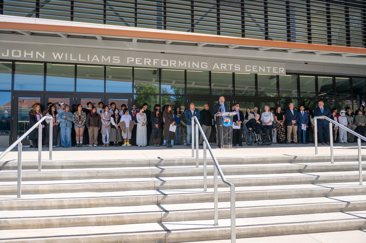 LASchools's tweet photo. Cue the applause for the new John Williams Performing Arts Center at North Hollywood High School. 🎭✨

Today, Los Angeles Unified celebrated the opening of a state of the art space where students will perform, create, and bring their stories to life for generations to come. Inspired by the legacy of distinguished North Hollywood alumnus John Williams, this new center reflects the power of arts education to spark imagination and open doors for students. 🎼🎬

This stage is ready for the next generation of musicians, performers, storytellers, and future award winners. 🌟
Congratulations, North Hollywood High School. The spotlight is yours. #LAUSD #NoHoHighSchool #JohnWilliams #ArtsEducation #FutureReady