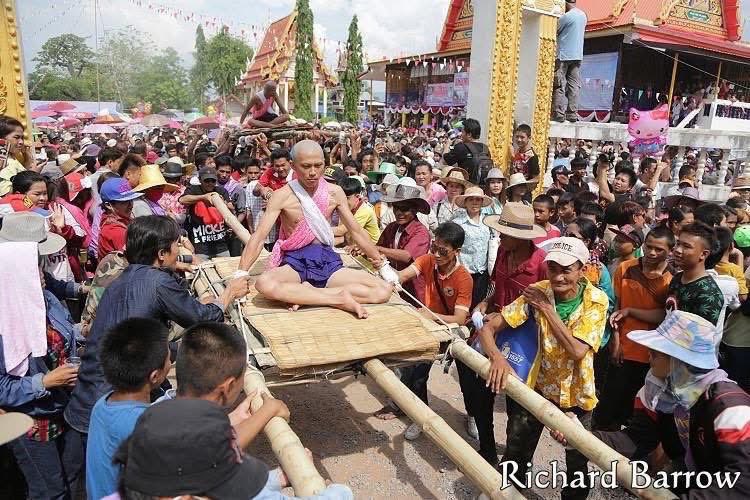 RichardBarrow's tweet photo. 🇹🇭 One of the more unusual events I’ve experienced in Thailand is the Brutal Ordination Parade at Wat Takaek in Chaiyaphum Province. It is taking place this year on 1-2 May 2026. 

This tradition is part of the local ordination ceremony, where young men demonstrate their determination to enter the monkhood in a truly unforgettable way. Participants are paraded through the temple grounds, often lifted, tossed, or challenged by the crowd and must keep their balance without falling. It’s a test of endurance and commitment before taking their vows.

Deeply rooted in Thai culture, the event blends spirituality with spectacle, drawing both locals and visitors who come to witness this intense rite of passage. While it may look chaotic, it carries symbolic meaning about resilience and readiness for the disciplined life of a Buddhist monk.

📍MAP: https://t.co/253cTHuaE8

#Thailand #Chaiyaphum #ThaiCulture #BuddhistTraditions 🙏🇹🇭