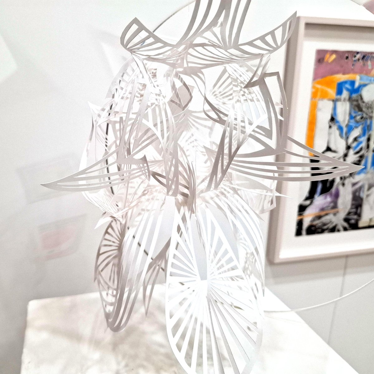 kunstkauf's tweet photo. An unserem Stand auf der paper positions in Berlin mit dabei: die wunderbaren stillen schwebend tanzenden Flügelwesen von Christiane Gaebert, geschnitten aus einem Blatt Papier. https://t.co/kqt6MvQ2pO