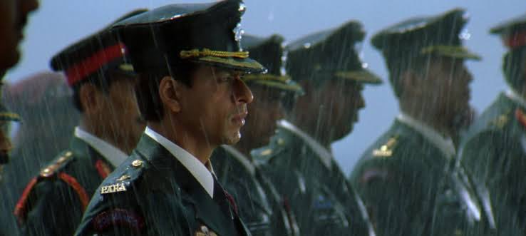 SRKUniverse's tweet image. Major Ram Prasad Sharma taught us that love and friendship have no boundaries. As we celebrate this milestone, tell us:

Which iconic song from the movie is still on your playlist today? 

@iamsrk #22YearsOfMainHoonNa 

#KING #KINGTitleReveal #ItsKingTime #ShahRukhKhan #SRK