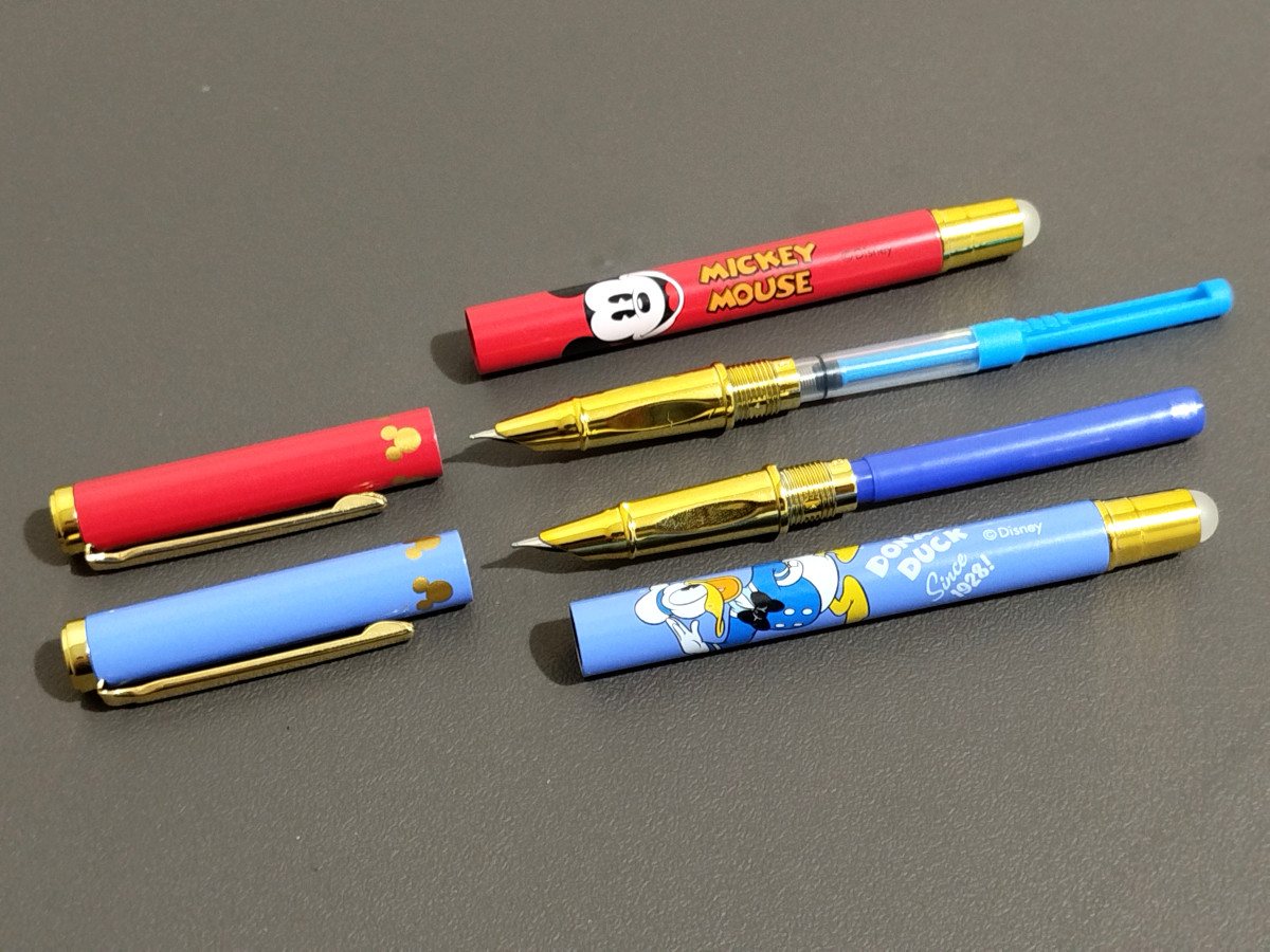 JDanuel_S's tweet photo. These pens were on sale, so why not? I'm bought it for the Donald Duck pens though; the Mickey Mouse pens are more of a bonus. The set came with blue ink cartridges, but I also just placed an order for some black ink since they all have ink converters. #fountainpen #Disney https://t.co/GlPLttUq3m