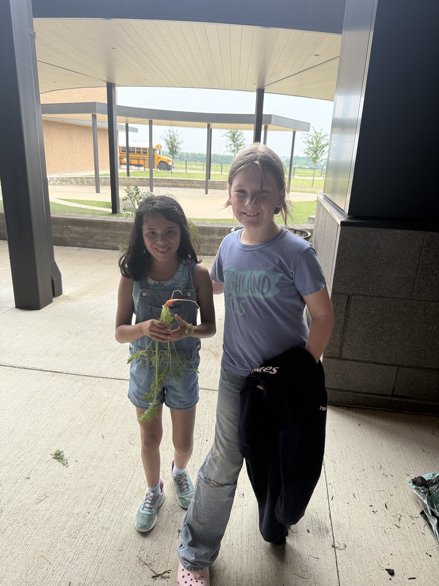 PHEmisd's tweet photo. What do you do after a month full of tests? You touch grass! Fourth and 5th graders harvested carrots in the school garden for a much needed nature break! https://t.co/NCf9azDHNr