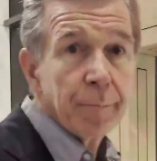 Ms_Nevva_Eatbug's tweet photo. @NCGOP For the last few months I've posted this pic of Cooper at every opportunity; sometimes suggesting it should be used in Republican campaign materials. YAY!

It's a screenshot from a reporter's video just after she asked him a question about Iryna.

He said nothing, and ran AWAY! https://t.co/QZYGUAJTx7