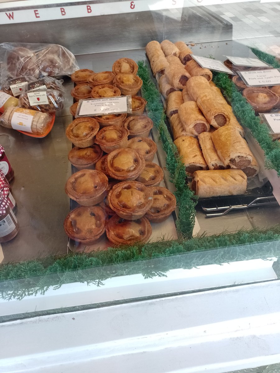 LachlanMain's tweet image. NORTHWICH 2026.
The scene in a butcher's shop window. Every one a temptation. 
#Northwich #butchers #pies #sausagerolls