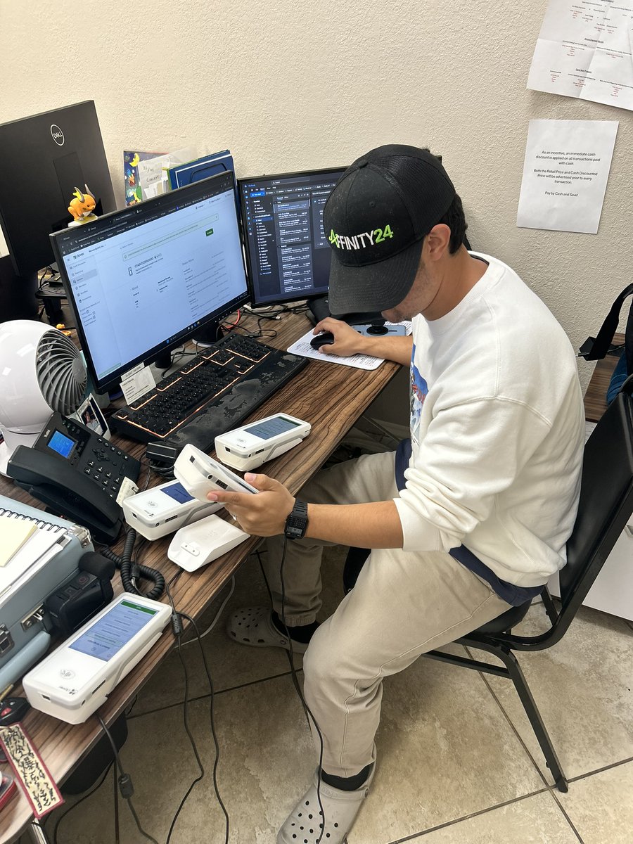 Affinity24's tweet photo. Aaron Parada in the lab programming multiple terminals at once like a payment-processing octopus. 🐙💳

At #Affinity24, we believe in hands-on support and doing the job right before it reaches the client.

Real people. Real help. Real fast.

#MerchantServices #SmallBusiness https://t.co/z78K3vIOER