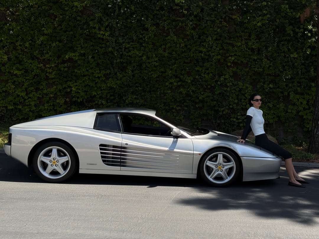 Kendall Jenner casually reminding us how crazy her car collection is with this Ferrari 512 tr