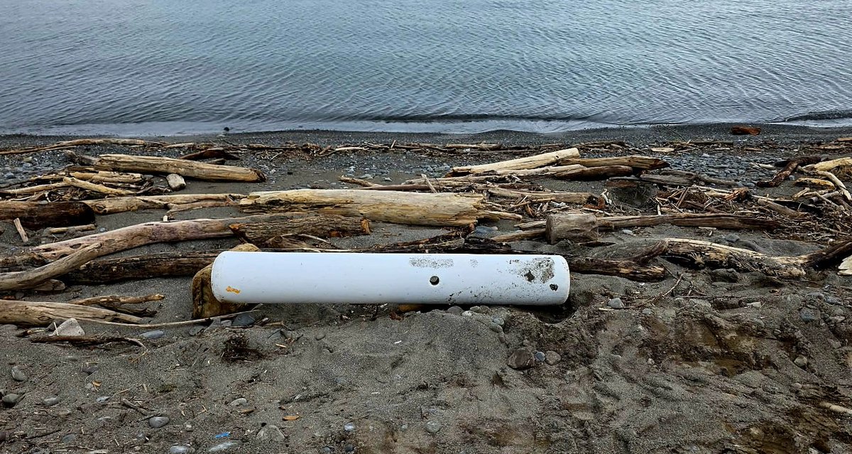 A "keep out" bouy washed ashore after a recent storm. It's coming home with me for the collection!