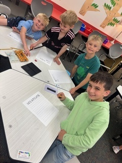 PCESMustangs's tweet photo. First graders stepped back in time, using stamps to experience life as colonial journalists working at a printing press! 📰✨ Hands-on history in action as they learned how news was shared long ago. #PCES #SpringHillSchools https://t.co/zE7x60NQ2X