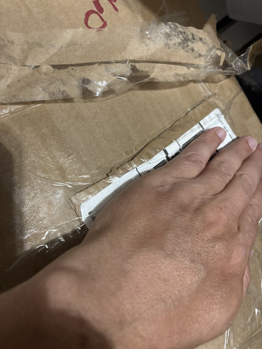 AFCOP13's tweet photo. @wizebuddha We opened them. Just water inside the boxes, got a promo wet, but the cards were fine. A couple ex’s anyway so whatever. We actually went to Costco they said I’d have to claim online. The issue is with ups. Someone knows the box was soaked and swapped packages. Look at the label. https://t.co/LkRMMP18YO