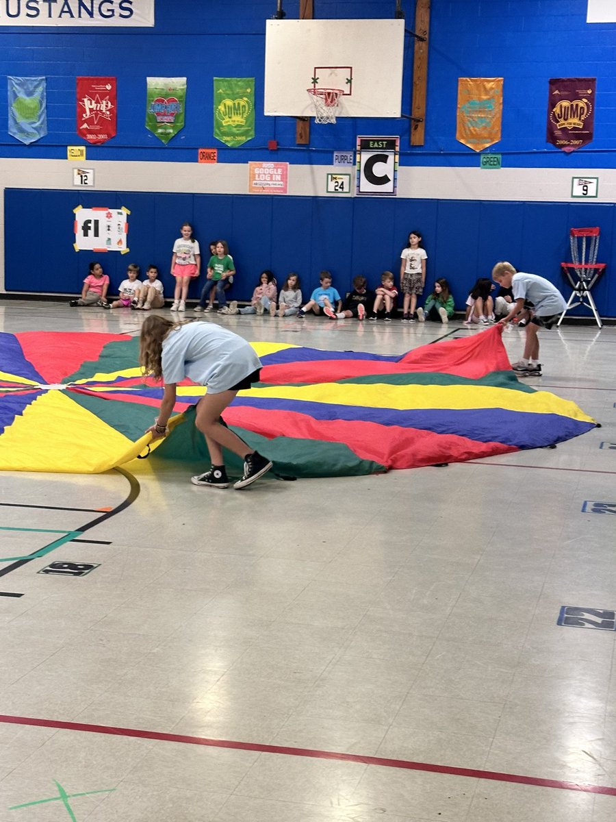 TheCoachFuller's tweet photo. Annual MHE Kids Takeover Day! Our PE Teachers for the Day got the full experience…teaching parachute and preparing for Field Day. They were a huge help and brought so much joy to our gym today! #mhepe #risddreambig #physed #risdmoves https://t.co/dHqhK2XYmy