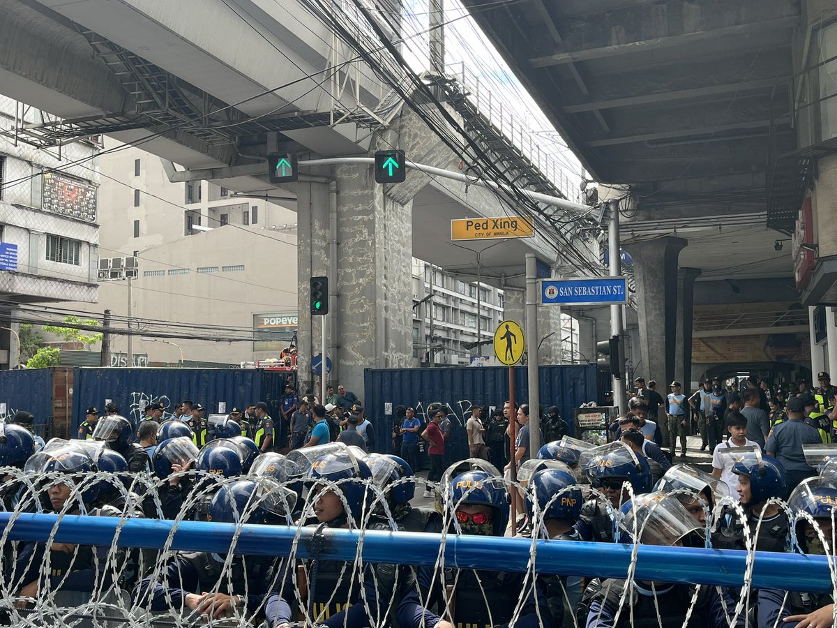 Rallyists have arrived at Nicanor Reyes Street to start their program after the Manila police installed physical barricade at San Sebastian Street on Friday. <a href="/PhilippineStar/">The Philippine Star</a>