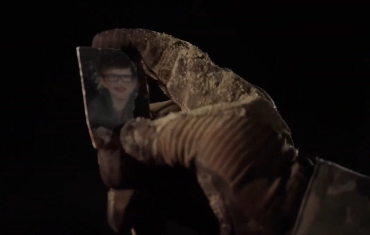 except he doesn't have a photo of chris with him this time