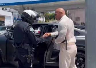 write_horror's tweet photo. The Rock pulled over by the police because of tinted windows. https://t.co/K6aS6fjY5R
