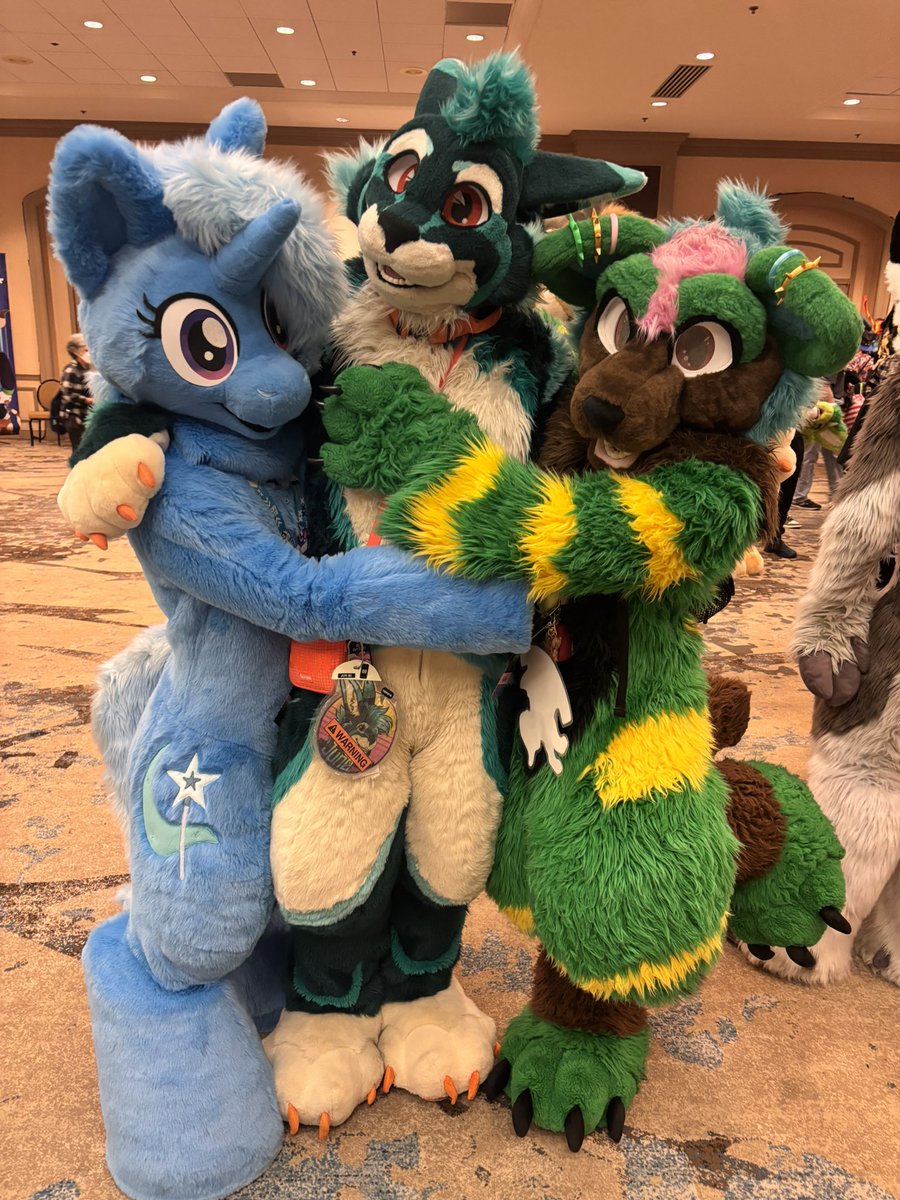 gr8np0werful's tweet photo. The great and powerful Trixie found some cute furry friends at #FurryFiesta2026! ft. @AthyLion and @Harcanine_D! #FursuitFriday #mlpfursuit https://t.co/8XGs9s5hZl
