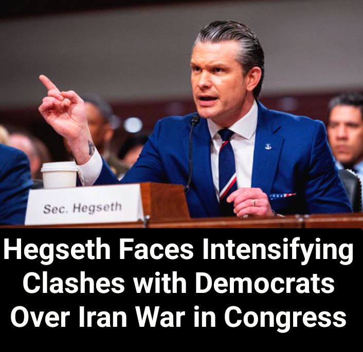 NewsSwifte's tweet photo. U.S. Defense Secretary Pete Hegseth has clashed for a second consecutive day with Democratic lawmakers in Congress, as tensions escalate over the Trump administration’s handling of the ongoing conflict with Iran..... 
More on https://t.co/z81sF4tQEG
#swifteradio 
#WallToWall https://t.co/tfKagMQmZf