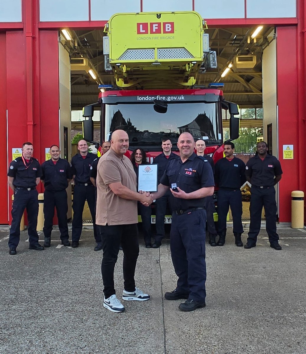 LondonFBU's tweet photo. Wimbledon Health and Safety rep, Leading Firefighter Andy Wilson, receives his 25 year award from FBU South West Area Secretary Dave Young https://t.co/TxkTB0pokQ