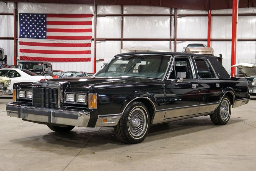 CustomTexan's tweet photo. No. I paid for everything I have had since I was a teenager. I worked 2 part time jobs in high school working 40hrs a week on top of a full schedule of advance placement classes.

 First car I bought was a 1989 Lincoln Town Car back in 2005 for $2k. This isn't my car, but mine looked exactly like this, color and all. 20+yrs later, I wasn't expecting my 1st car to be the best car I'd ever actually own. 

5.0 V8 which wasn't powerful but for the time, it didn't feel slow. Power windows, power locks, power leather seats, digital instrument cluster, HUGE sunroof, and original factory cd player. The instrument panel would tell you all sorts of useful information like specifically which light was out. Had the auto tint rear view mirror. Absolutely most comfortable seats and ride of any vehicle I've ever personally been in. Massive trunk and still had a full size spare. You could fit 6 bodies in it probably 🤣🤣🤣. I did seriously fit a full size beer keg and a 55gal trash can (for ice to set the keg in) side by side in the trunk with room to spare. 

I absolutely loved that car and still miss it. I didn't know how rare those cars would become, especially mine since it had every single bell and whistle except the air bag suspension. They're very hard to find. Even the less equipped options. The one I had in mint condition with all of the options I've seen go for around $30k. Needless to say I regret selling that car.