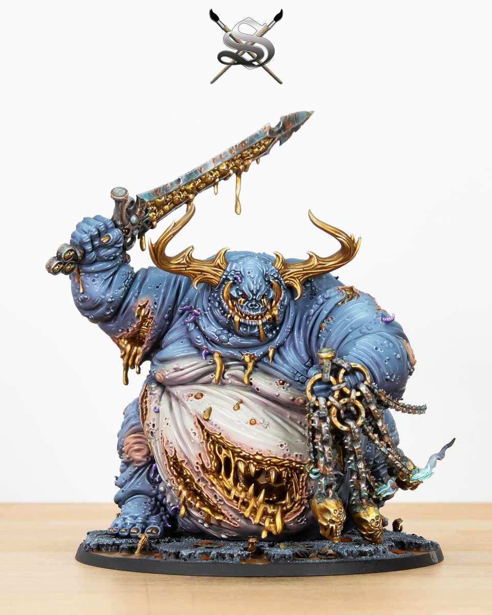 SiegeStudios's tweet photo. Greed and Gluttony! A truly awesome commission and idea by our client to have a Nurgle Great Unclean One in an alternate colour scheme with this cold blue grey toned version. 

For a quote or to book your commission:
https://t.co/Nx9uTpp0aw

The idea of this piece is all about him representing greed and gluttony. With all his gold detailing and bleeding gold from his wounds and spewing gold from his mouth. 

This was a really awesome spec and we loved the idea of representing something different than just pestilence or plague on this miniature which is more typical. 

🤢 What would you love to see represented on nurgle miniatures thats different to the normal?

#nurgle #plaguemarine #plaguelord #chaosspacemarines #chaosspacemarine
