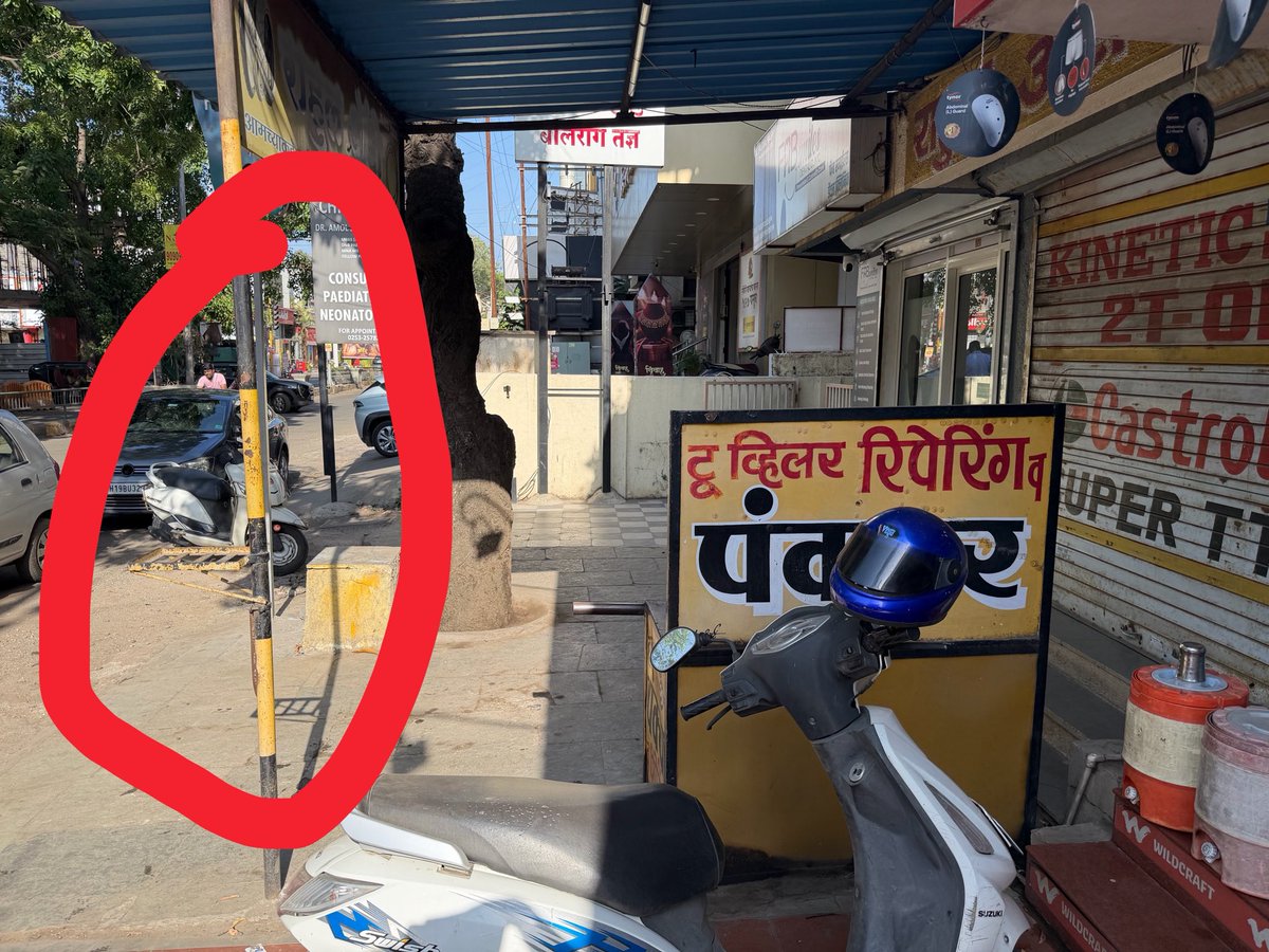 mandarchopde's tweet photo. @NashikCorp @my_nmc There is an encroachment at Canada Corner done by a two wheeler garage that’s really fatal for kids or old people or anyone. I request to remove this encroachment at the earliest or I have to file a police complaint against the shop owner and #NMC for INACTION https://t.co/ar5q02jjGT