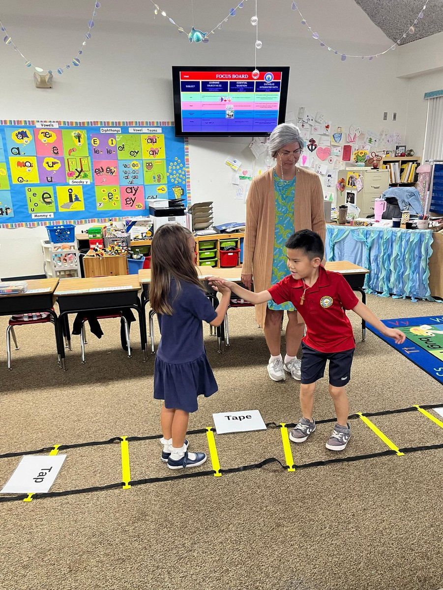StMarthaCS's tweet image. “Mommy Baez” came to visit Kindergarten as they learned about silent "e" and students practiced reading long and short vowel sounds while using an agility ladder! #LearningIsFun #75YearsOfExcellence