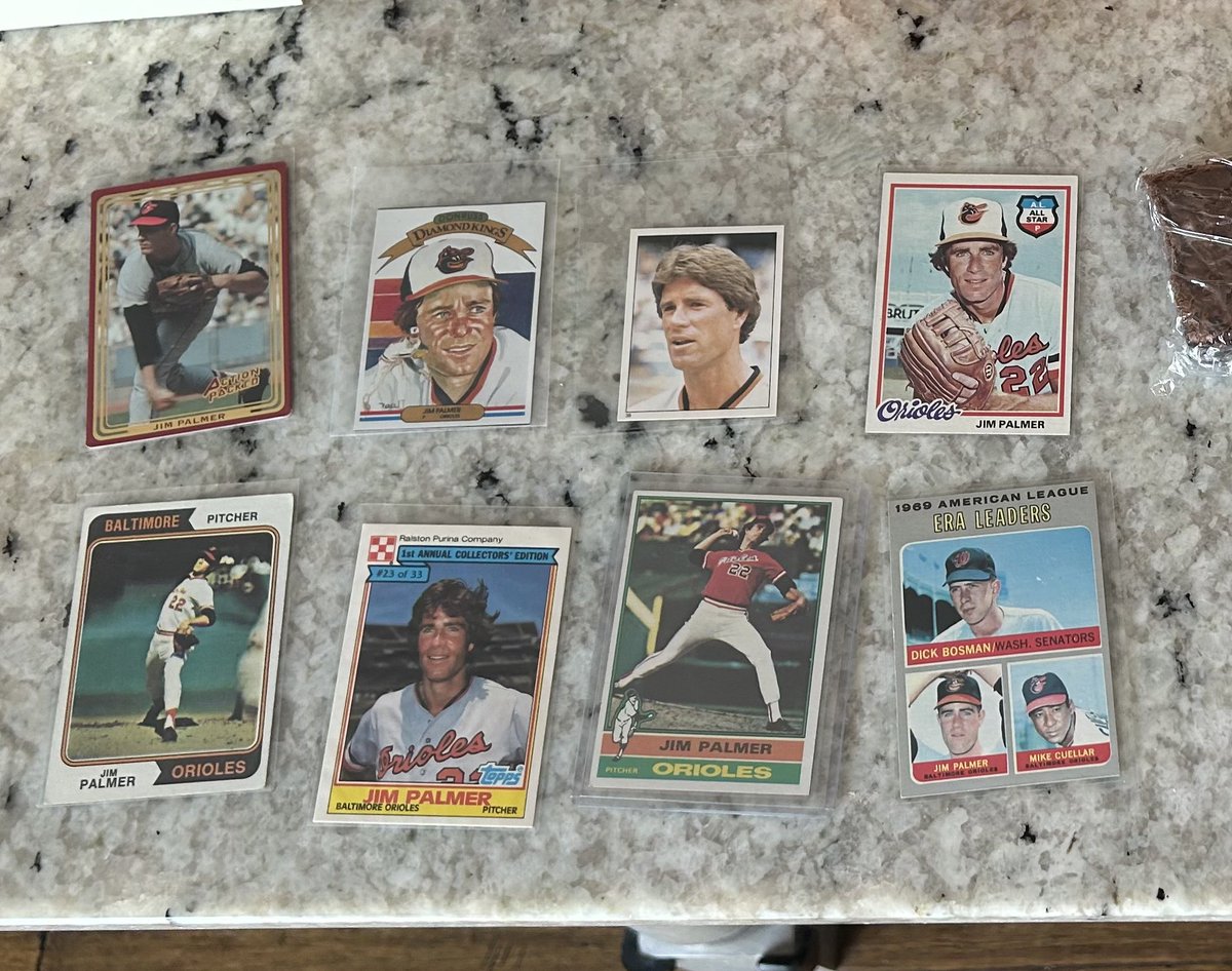 Foxy_Troxy_'s tweet photo. Palmer got to meet another Orioles fan today at a yard sale (Ripken, the dog!). 
We found quite a few @Jim22Palmer cards for him! Hoping to take Palmer to his first game at Camden Yards this summer and get one signed. 🧡🖤 Let’s Go O’s! https://t.co/8JoOnTgJwI