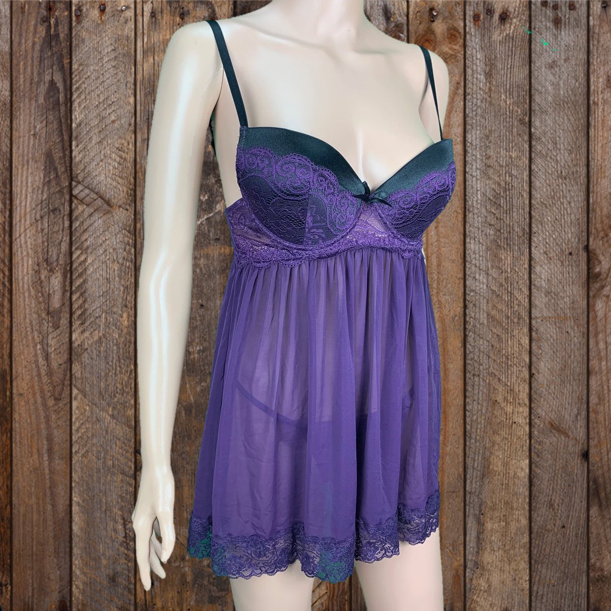 Purple Lace Babydoll 💜This purple, stretch mesh and lace babydoll features underwire push-up cups with stretch satin and lace overlay, adjustable shoulder straps and a hook and eye back closure.