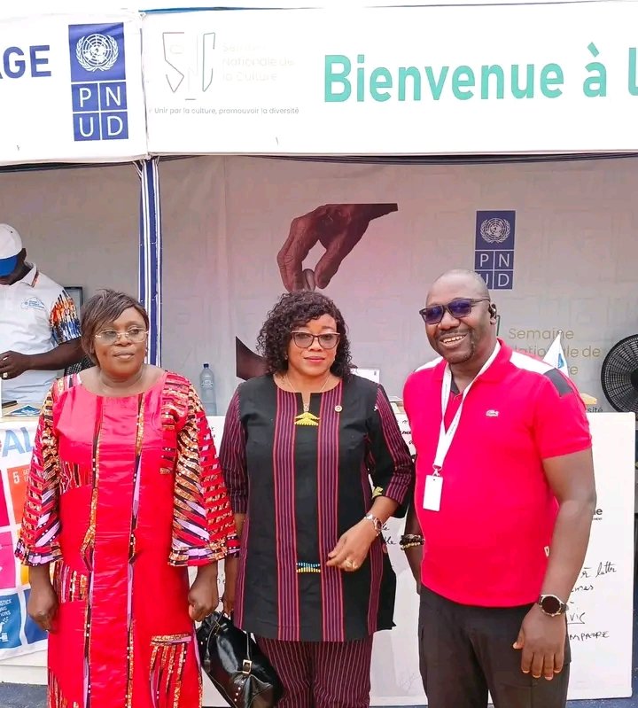 JeanJackOdg's tweet photo. #SNC2026 : En parfaite symbiose avec les festivaliers !
Au cœur du Village des communautés, le stand conjoint du PNUD et de la Brigade Centrale de Lutte contre la Cybercriminalité (BCLCC) continue d'attirer des personnalités ! https://t.co/f6sCKlnuq9