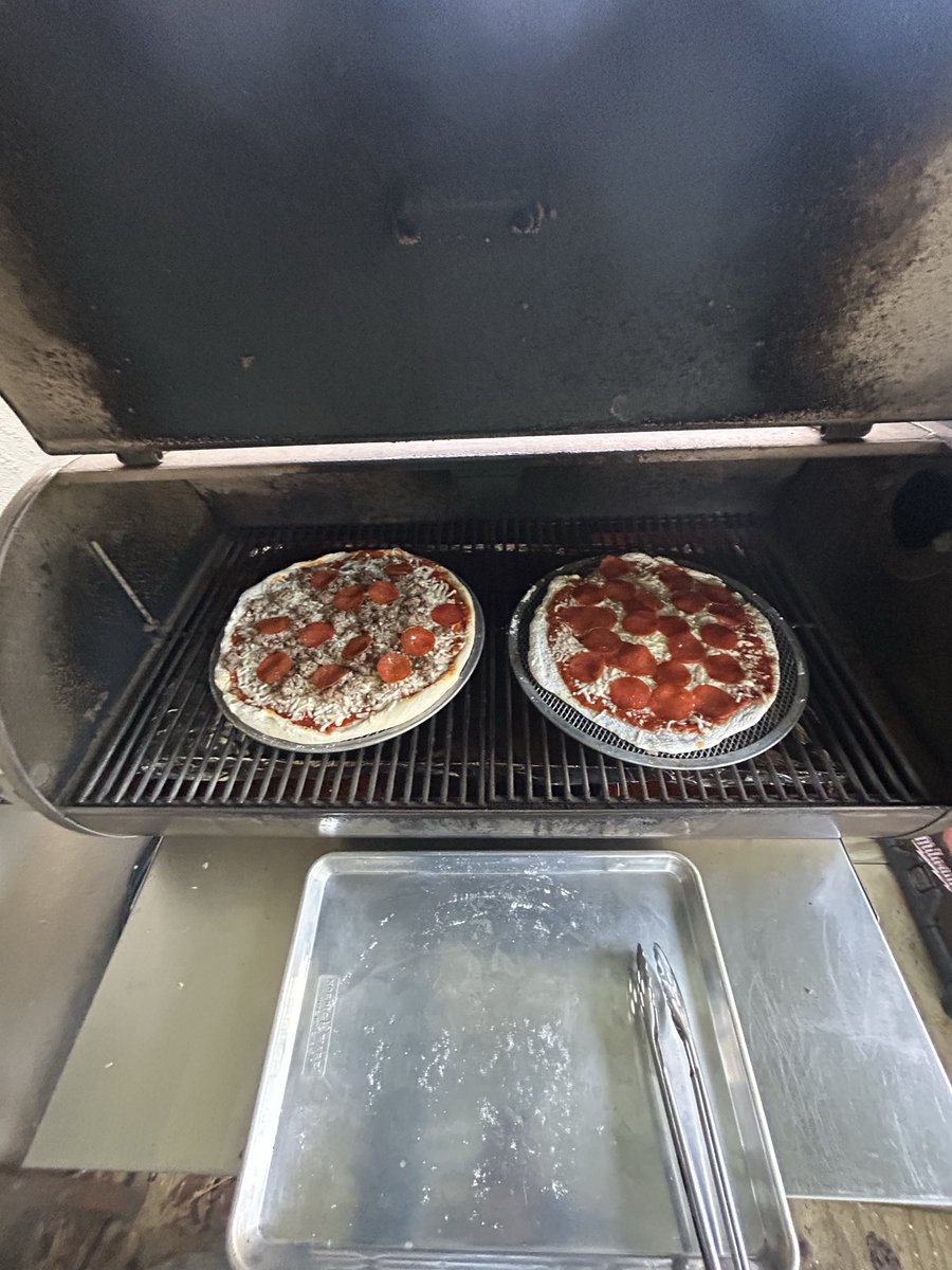 Nextchapter66's tweet image. Wades Friday night pizza. And he’s wearing more of the flour than was on the counter lol