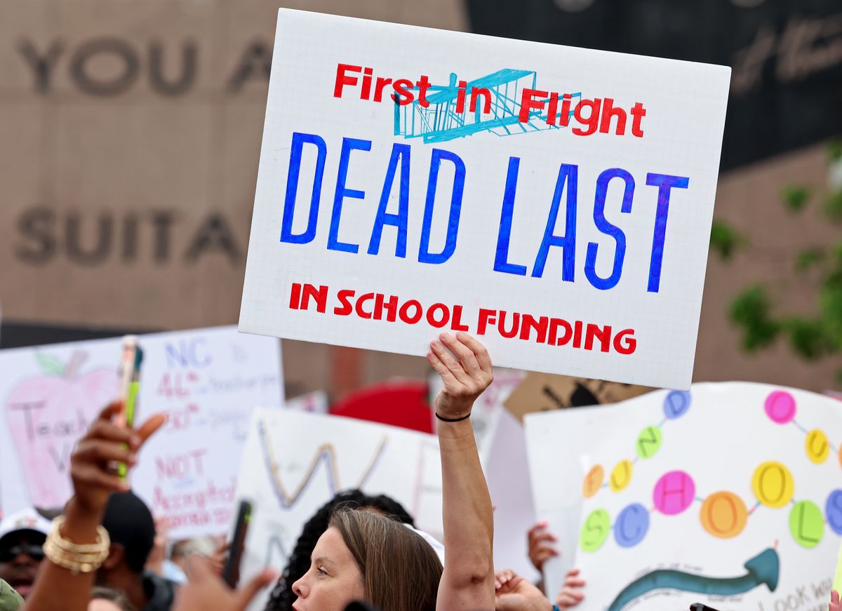 theobserver's tweet image. Signs, signs, signs were everywhere as teachers rallied at the Government Complex in Raleigh on Friday.

Teachers rallied and marched through downtown Raleigh to protest the need for more funding for public schools.

📸: Jeff Siner

#charlotte #teachers #raleigh #rally