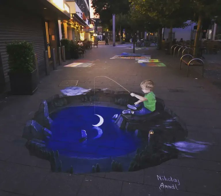 Toastiewiththe's tweet image. This Feels Too Real by Nikolaj Arndt #streetart
 🌙 Night Fishing in a Moon Pool —  in Germany 🇩🇪