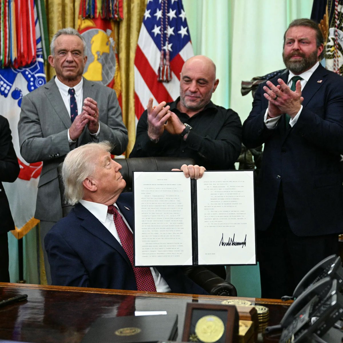 RpsAgainstTrump's tweet photo. Joe Rogan slams Trump’s DOJ:

“The whole is Epstein thing is so crazy, the fact that no one has gone to jail for that. Here’s what’s crazy. No arrests. No one’s being brought in. Meanwhile, Comey is getting arrested for a photo of seashells that say ’86 47’. 

If you get fired, what happened to Mike? He got 86ed. It doesn’t mean you got killed. But this is a crazy thing to arrest someone for. The problem with these guys is it sets a crazy precedent…

This is a slippery f*cking slope you’re going down.”