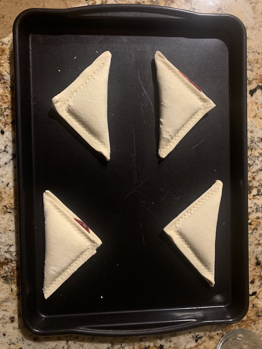 It’s my last night in my aunt’s house, so I’m cooking these raspberry turnovers I found in the freezer