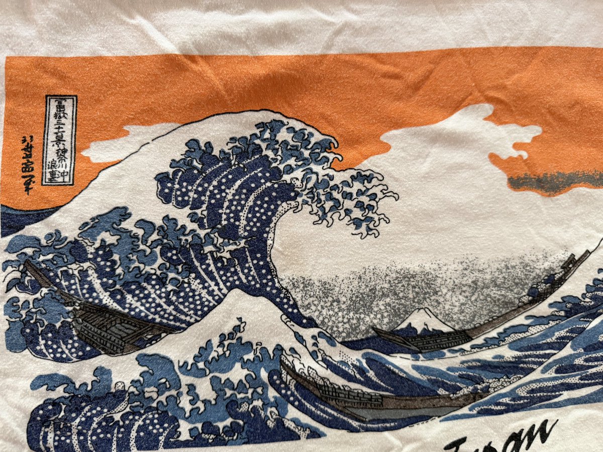 abhiyogi's tweet image. This text is on a T shirt that I bought from #Japan .

Google translate is unable to translate it.  

Grok says it is from Katsushika Hokusai’s famous woodblock print The Great Wave off Kanagawa (神奈川沖浪裏, Kanagawa-oki Nami Ura), part of the Thirty-six Views of Mount Fuji
