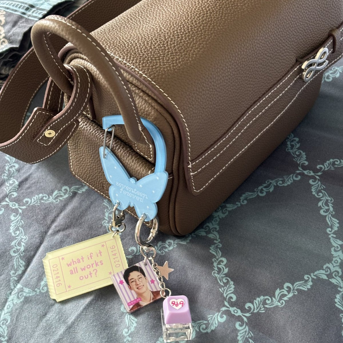 wonukaiz's tweet photo. Today’s bag and charms 🦋🌸💟 https://t.co/F8D7iH73l5