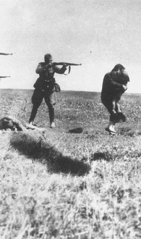 Ivanhorod, Ukraine, SS soldiers  execute a Jewish woman, clutching a child in her arms. 1942.

The Holocaust By Bullets represents the first phase of the Holocaust in which an estimated 1.5 million Jews were shot to death at close range in ravines, open fields, and forests.
