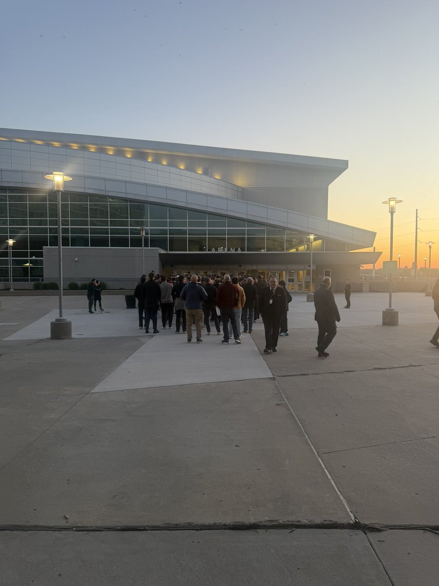 ewstone's tweet photo. Here we go! Lined up in Omaha for the 2026 Berkshire Hathaway Annual Meeting.

Crowds are smaller than historically but still sizable. https://t.co/hQOpPgpPZQ