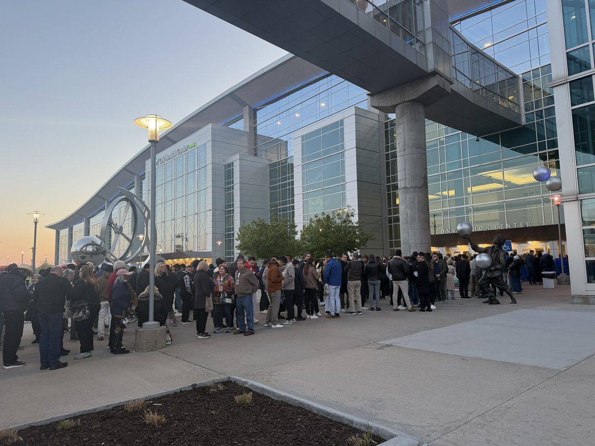 ewstone's tweet photo. Here we go! Lined up in Omaha for the 2026 Berkshire Hathaway Annual Meeting.

Crowds are smaller than historically but still sizable. https://t.co/hQOpPgpPZQ