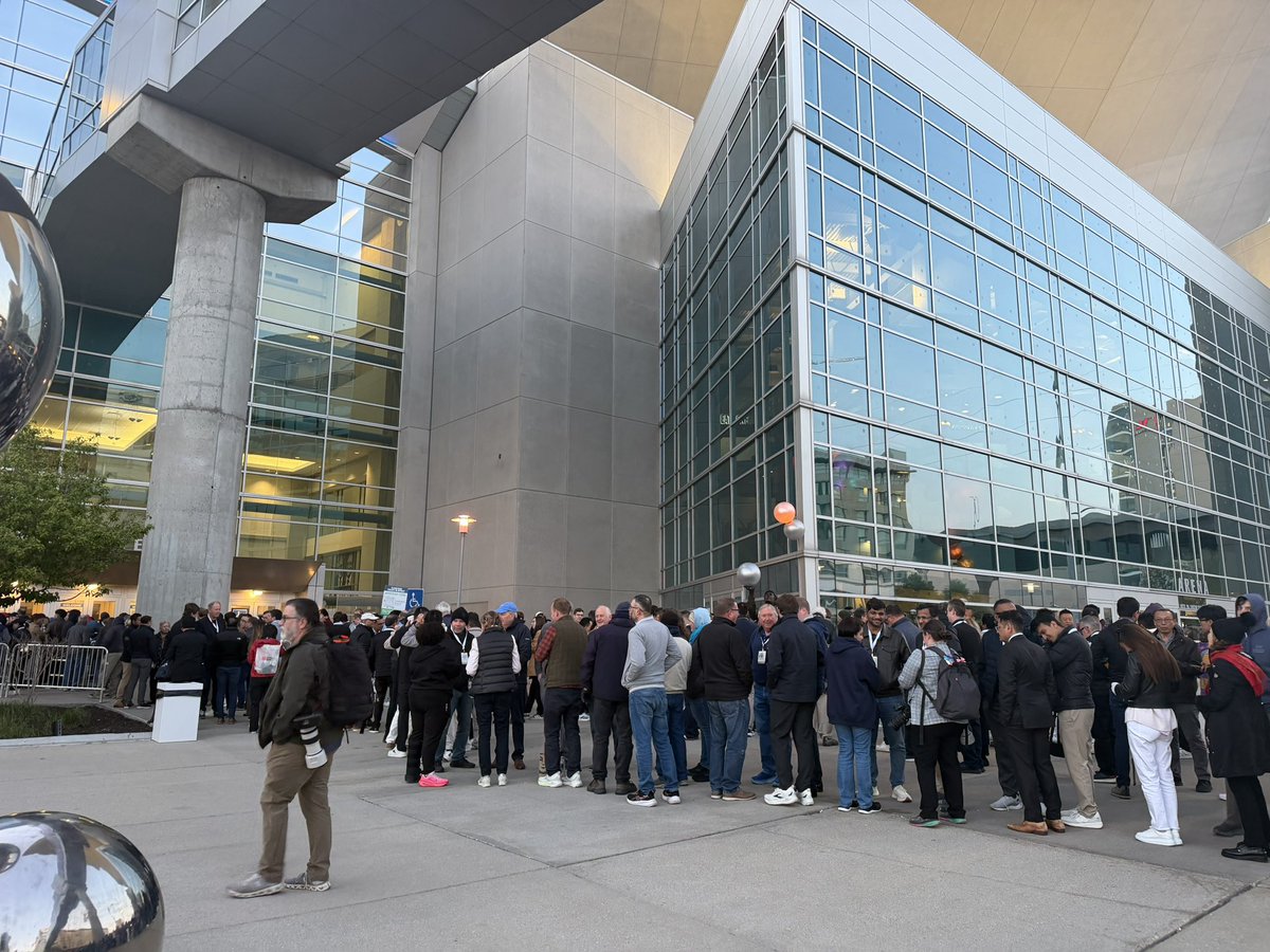 ewstone's tweet photo. Here we go! Lined up in Omaha for the 2026 Berkshire Hathaway Annual Meeting.

Crowds are smaller than historically but still sizable. https://t.co/hQOpPgpPZQ