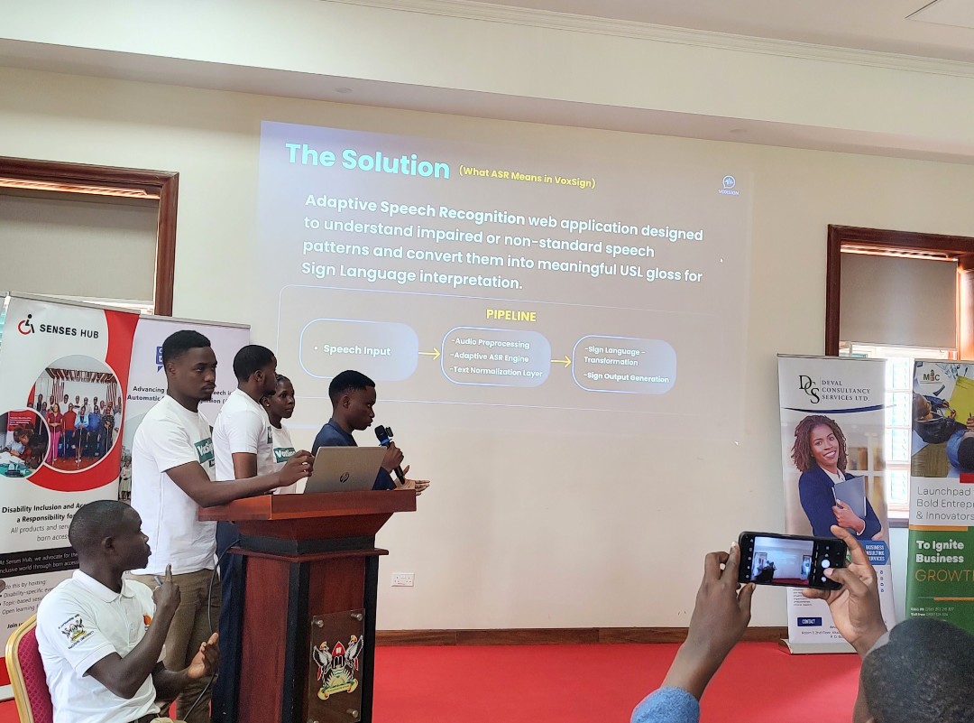 miic_ug's tweet photo. Now on stage: Team Voxsign 🎤🚀 

Voxsign is an adaptive speech recognition web application designed to understand impaired and non-standard speech patterns and convert them into meaningful Ugandan Sign Language gloss for sign language interpretation. 

A powerful step toward bridging communication gaps and making conversations more inclusive through AI

#InnovateWithUs #AT2030Programme
@senses_hub @GDIHub