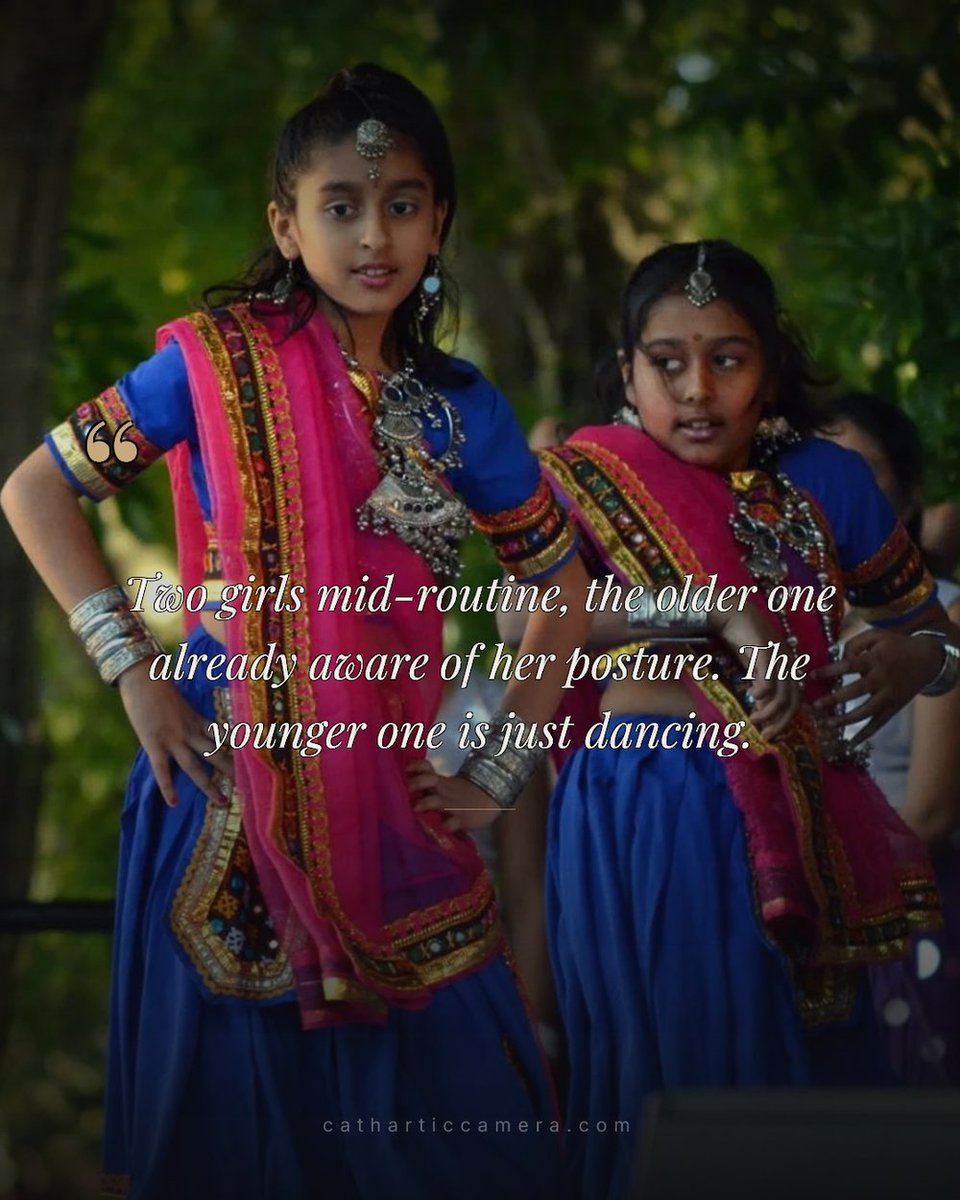 Catharticcamera's tweet photo. Two girls in the same routine: the older one is already holding her form. The younger one is just dancing. That gap — before discipline becomes conscious — is the photograph. https://t.co/cTGTXOKSv4