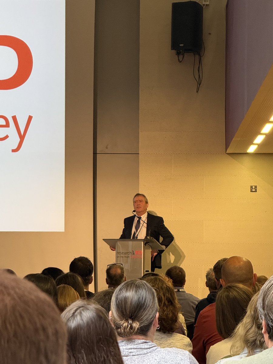 NPorter_'s tweet photo. Listening to a welcome speech with a fun anecdote about the MADNESS of national curriculum “levels of progress” back in the day at @researchEDGsy. 
This is a strong reminder about the risks of having a compulsory national curriculum when the evidence continues to evolve. https://t.co/JlQLbh7tLu