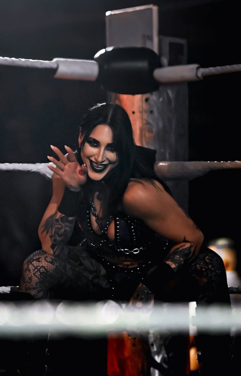 RhiAndroid1990's tweet photo. I need to know what brand of black lipstick @RheaRipley_WWE uses because that stuff STAYS 🖤😭 https://t.co/4EeuNfKd6N