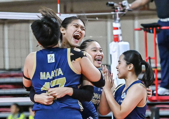 nationalufan's tweet photo. Chammy Maaya (5) and Alexa Mata (3) brought the umbrellas out after tallying 8 kill blocks for the gold and blue 💛💙 https://t.co/PlPLvCrSfI