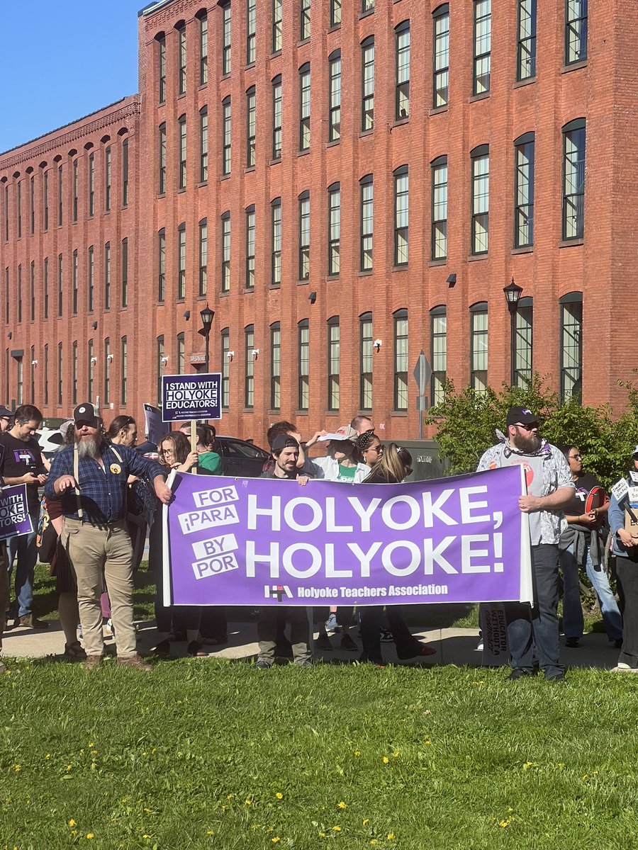 MassNurses's tweet photo. MNA Member Mary Koch-Rodriguez and her daughter Addison Rodriguez at the Holyoke May Day Action, where not only did we march for Workers over Billionaires but also marched in solidarity with the Holyoke Educators. 

Great event with hundreds of people! 

#mayday https://t.co/jMqfbOv0Rg