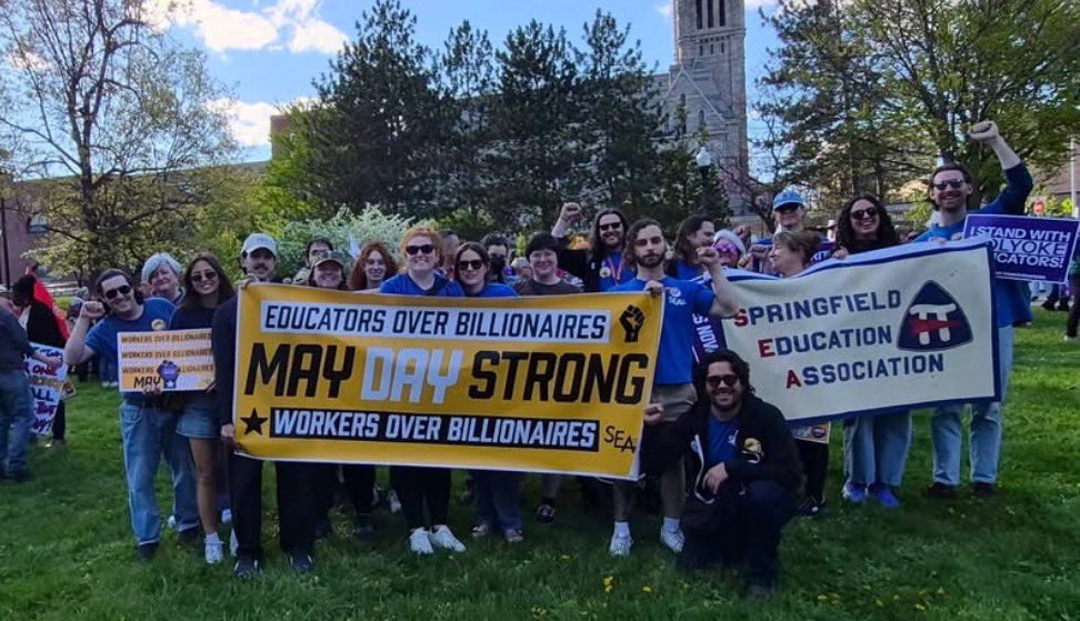 MassNurses's tweet photo. MNA Member Mary Koch-Rodriguez and her daughter Addison Rodriguez at the Holyoke May Day Action, where not only did we march for Workers over Billionaires but also marched in solidarity with the Holyoke Educators. 

Great event with hundreds of people! 

#mayday https://t.co/jMqfbOv0Rg
