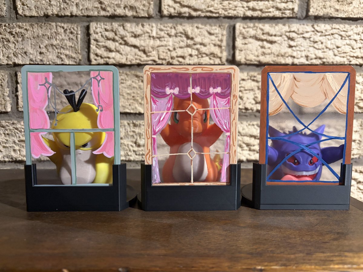 Symbiotic_Storm's tweet image. Finally can show these off! I have 10 available, you can mix and match the pokemon and the window frame (drawn by the amazing @poke_katiekat). Pokemon available: Pikachu, Eevee, Jigglypuff, Gengar, Kanto starters, Psyduck and Snorlax. $25 shipped per piece. #3dprinting #pokemon